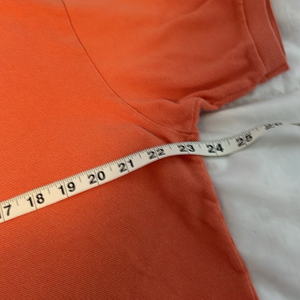 Lacoste polo in coral/pastel orange. Size 6 measures 23 in across/24 in length - Picture 3 of 4